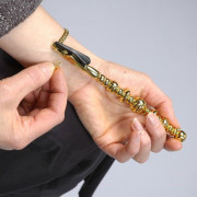 Attache bracelet doré