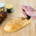 Couteau de table avec manche coudé Couteau de table avec manche coudé